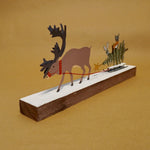 Reindeer Pulling Tree