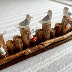 Long Row of Gulls and Bouys