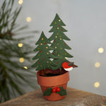 Robin and Christmas Trees in Pot